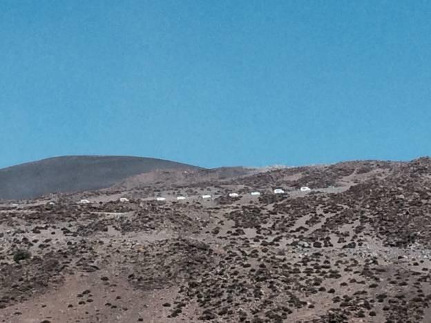 Then they climbed into white SUVs and drove up. It was an ill feeling to look up and see this line of vehicles.