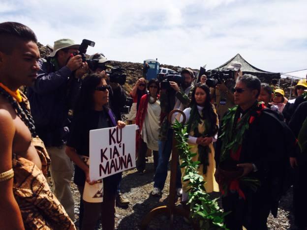The minister on the right, former Senator Daniel Akaka's son, was about to sell out fellow Hawaiians by blessing the project. Instead, his own people told him he had to stop.